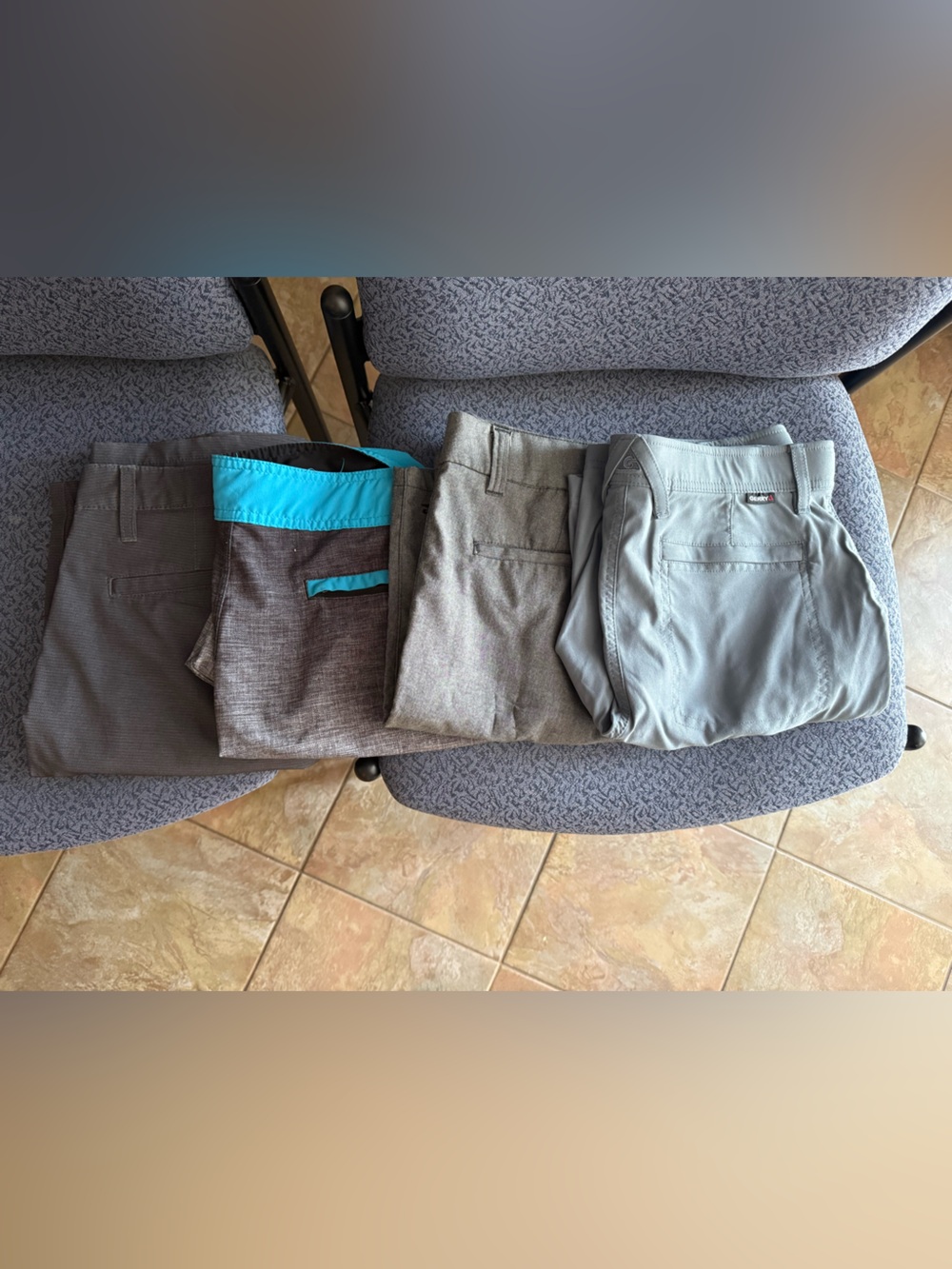 4 pairs of shorts.  Hurleys are well worn and the other 2 are like new.